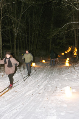 Jean and Dave Hildreth, of Montpelier, take part in a candlelight ski and hike at Whitefish Dunes State Park in 2013. Photo by Len Villano.