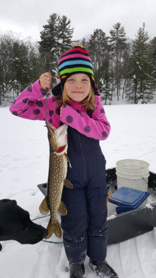 Northern Pike put up a strong fight, but this one was no match for Cecelia Toshner, 5. Photo by Wisconsin Department of Natural Resources.